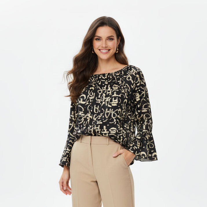 Black NO AGE blouse with a round neckline and fancy design, showcasing a stylish chemisier for women.