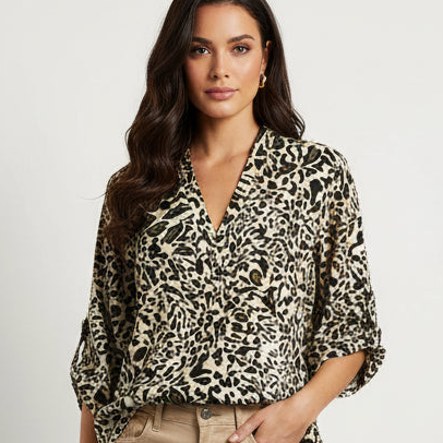Long leopard print blouse by NO AGE, featuring a relaxed fit and button-down front, perfect for casual or dressy wear.