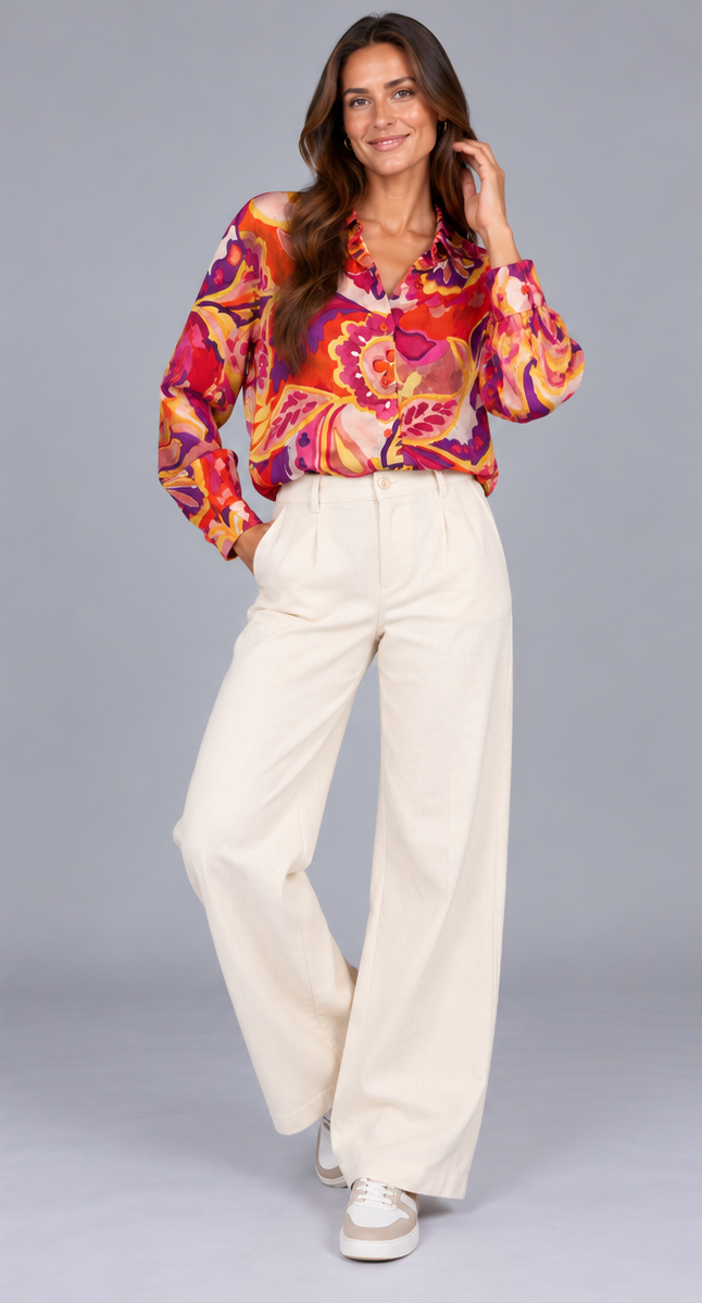 Chemisier femme fantaisie multicouleur NO AGE, ample avec motifs colorés, porté avec manches longues et col en V.